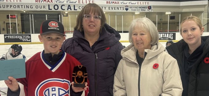 Winner Charlie Gilbert with the Harvey family